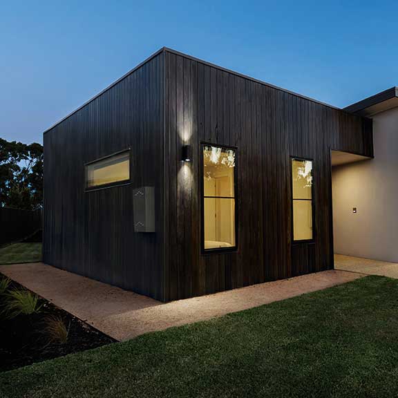 Finished and painted cladding